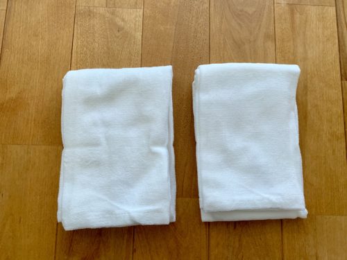2枚組で490円の無印良品「オーガニックコットン・極薄手 巻いて結べる長タオル / オフ白」